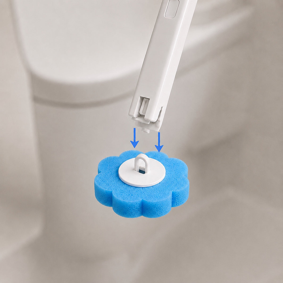 Attaching a disposable blue cleaning head to the HOMI reusable wand
